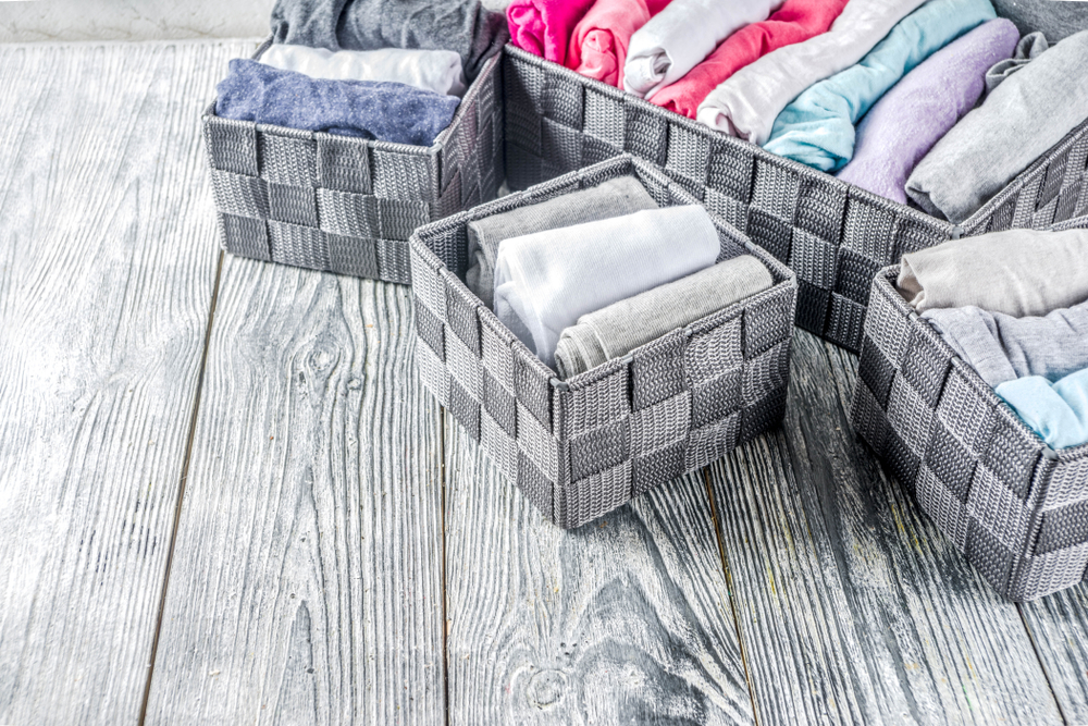 laundry basket full of folded clothes